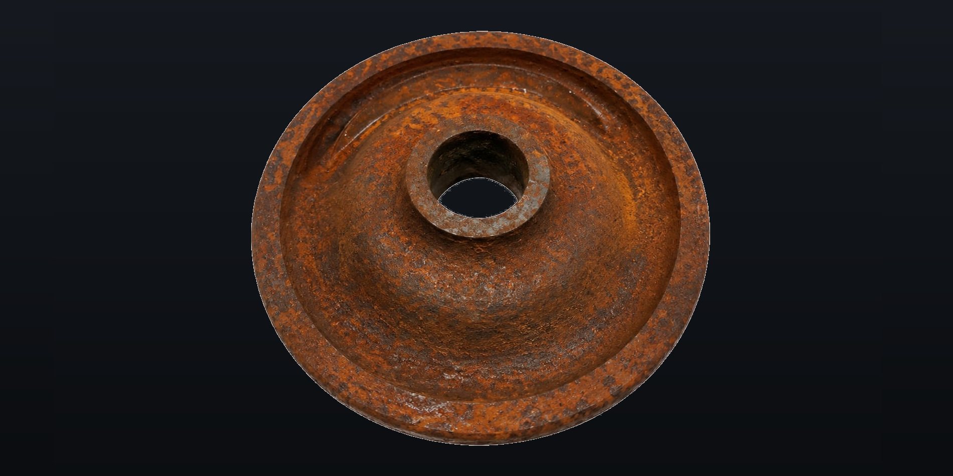 Round steel component with rust before laser cleaning