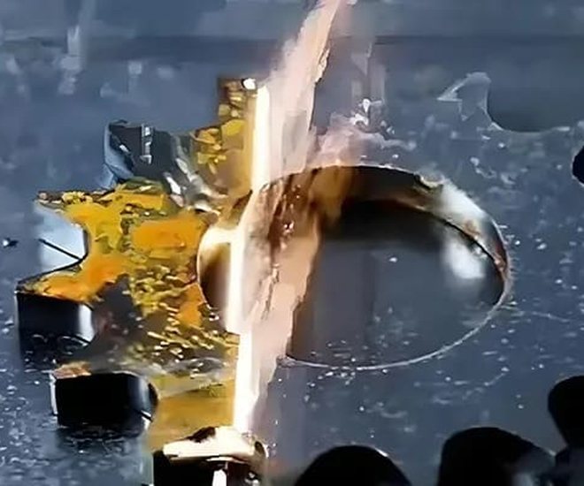 Laser cleaning of a gear wheel: oxide and scale are removed